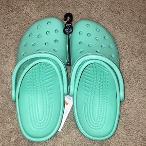Teal crocs